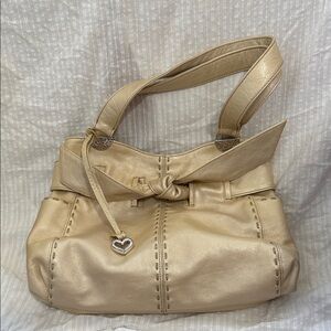 Brighton Clara Bow Accent Leather Hobo Shoulder Bag in Metallic Champagne